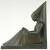 Art Deco figural bookends in the form of reading ladies.