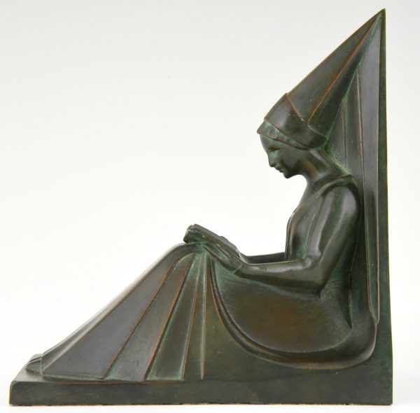 Art Deco figural bookends in the form of reading ladies.