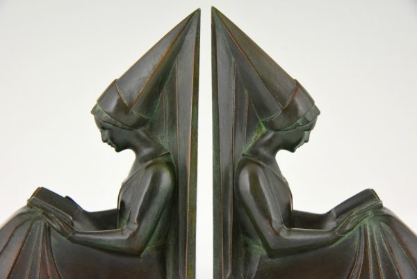 Art Deco figural bookends in the form of reading ladies.