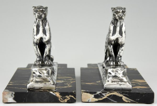 Art Deco panther bookends.