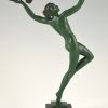 Art Deco sculpture of a nude with a branch of grapes.