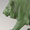 Sculpture Art Deco lion marchant.