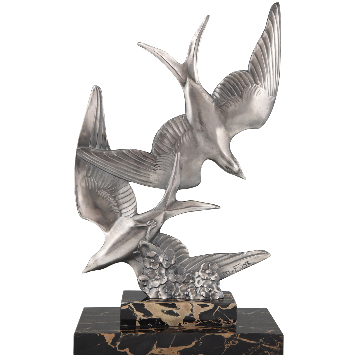 Art Deco sculpture of two flying birds.