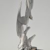 Art Deco sculpture of two flying birds.