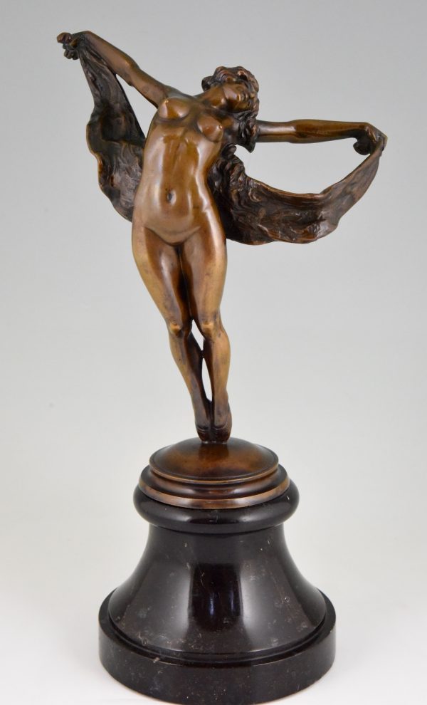 Art Nouveau bronze sculpture of a dancing nude.