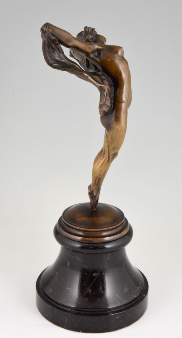 Art Nouveau bronze sculpture of a dancing nude.