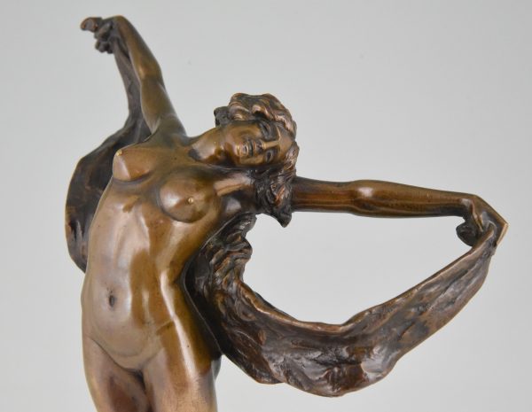 Art Nouveau bronze sculpture of a dancing nude.