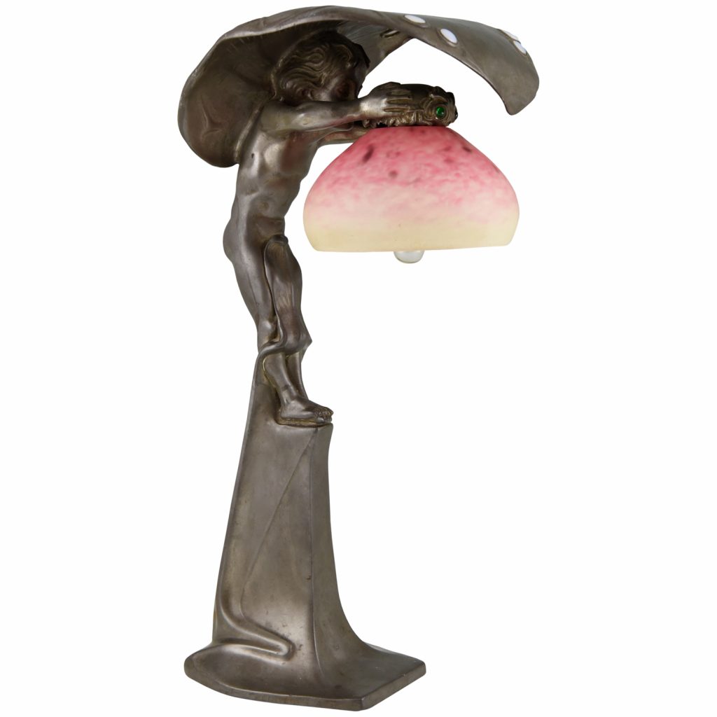 Art Nouveau lamp with boy sheltering under a leaf. - Deconamic