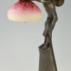 Art Nouveau lamp with boy sheltering under a leaf.