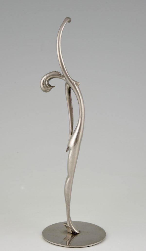 Art Deco sculpture of a standing female nude.