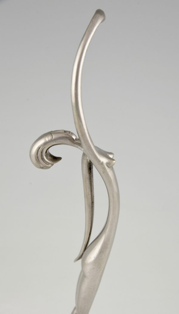Art Deco sculpture of a standing female nude.