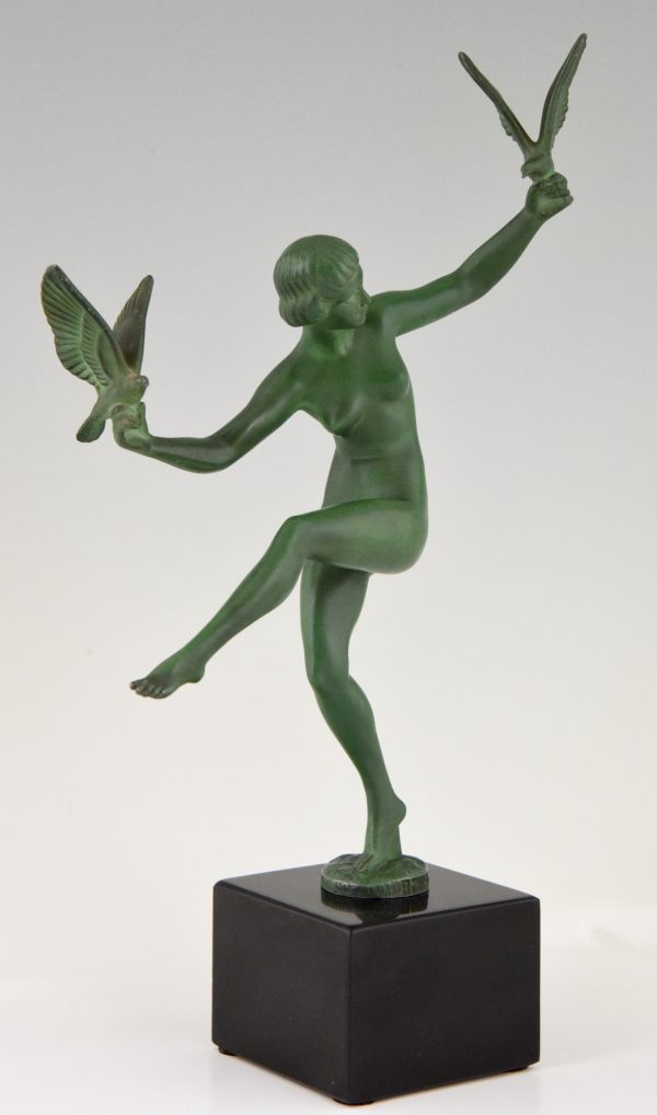 Art Deco sculpture nude dancer with birds.