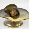 Inktpot in brons met schelp, bronzen vogel en ei.