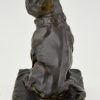 Bronze sculpture of a sitting French Bulldog