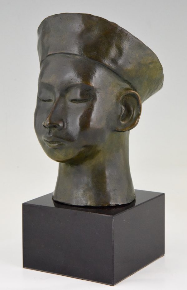 Art Deco bronze bust Chinese boy with hat and braid.