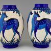 Pair Art Deco craquelé ceramic vases with blue deer