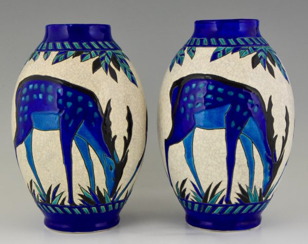 Pair Art Deco craquelé ceramic vases with blue deer