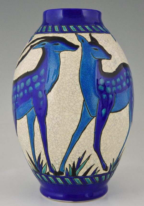 Pair Art Deco craquelé ceramic vases with blue deer