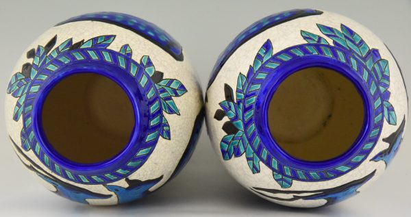 Pair Art Deco craquelé ceramic vases with blue deer