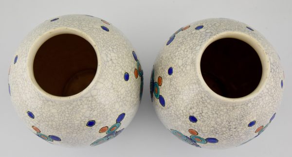 Pair of Art Deco craquelé vases with stylized flowers