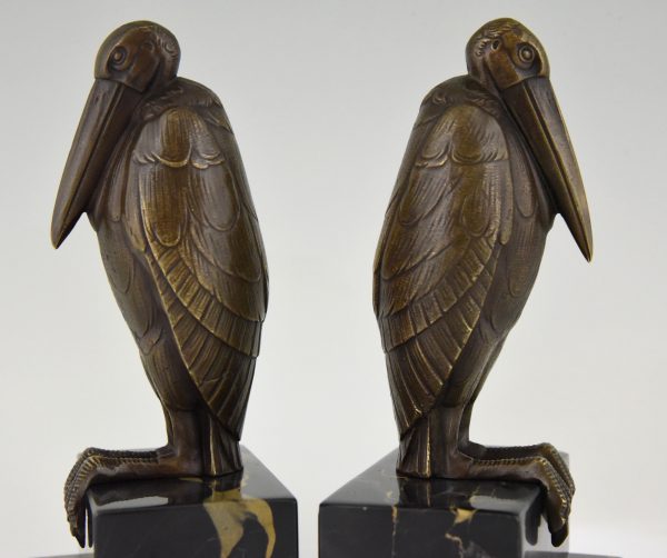 Art Deco bronzen boekensteunen met marabous