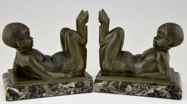 French Art Deco bookends with lying satyrs