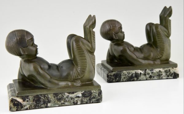 French Art Deco bookends with lying satyrs