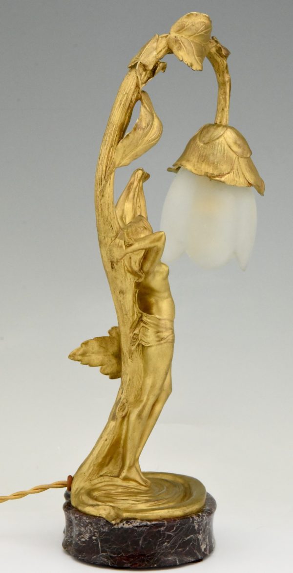 Art Nouveau lampe en bronze doré femme nue au fleur