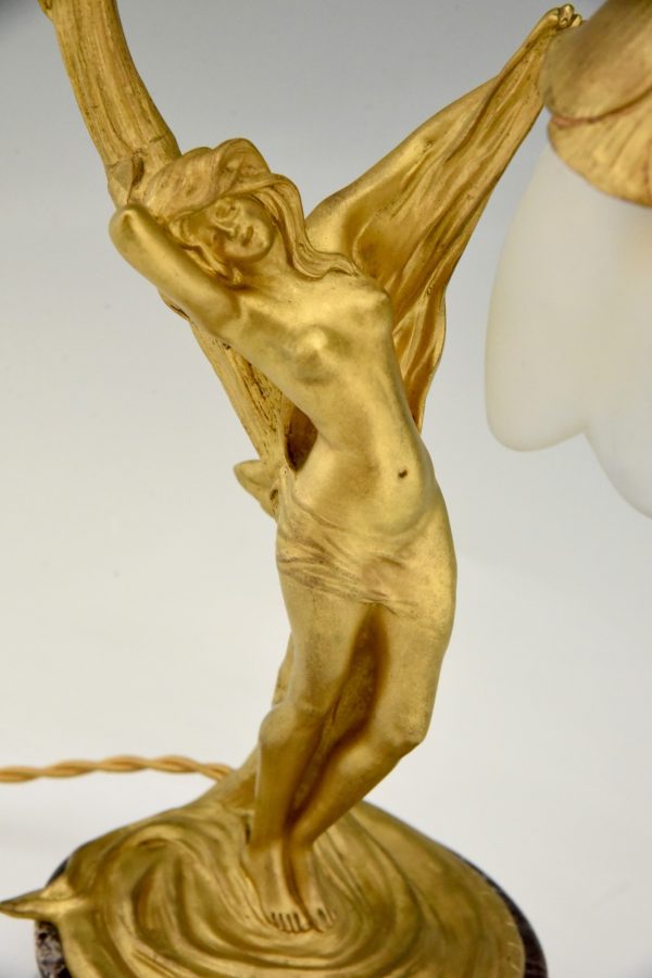 Art Nouveau lampe en bronze doré femme nue au fleur