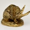 Antique bronze sculpture of a hare washing