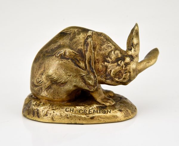 Antique bronze sculpture of a hare washing