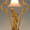 Art Nouveau gilt bronze lamp with lady and cupid