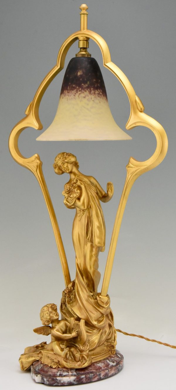 Art Nouveau gilt bronze lamp with lady and cupid