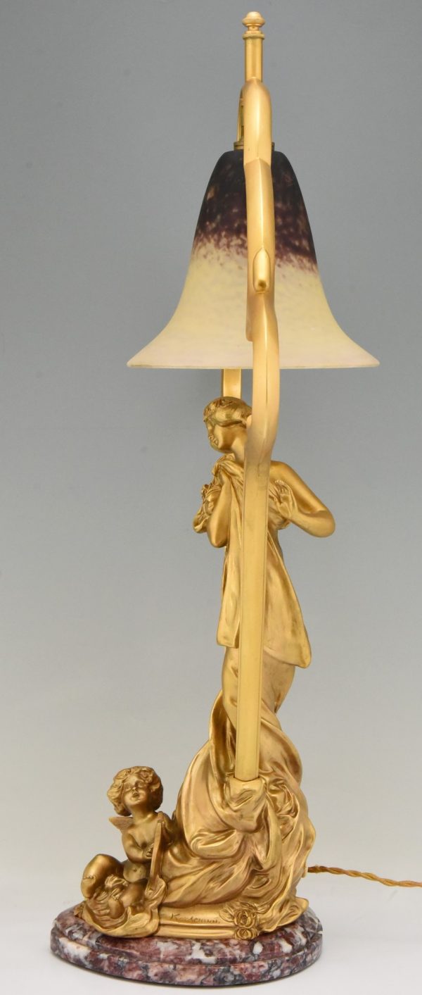 Art Nouveau gilt bronze lamp with lady and cupid