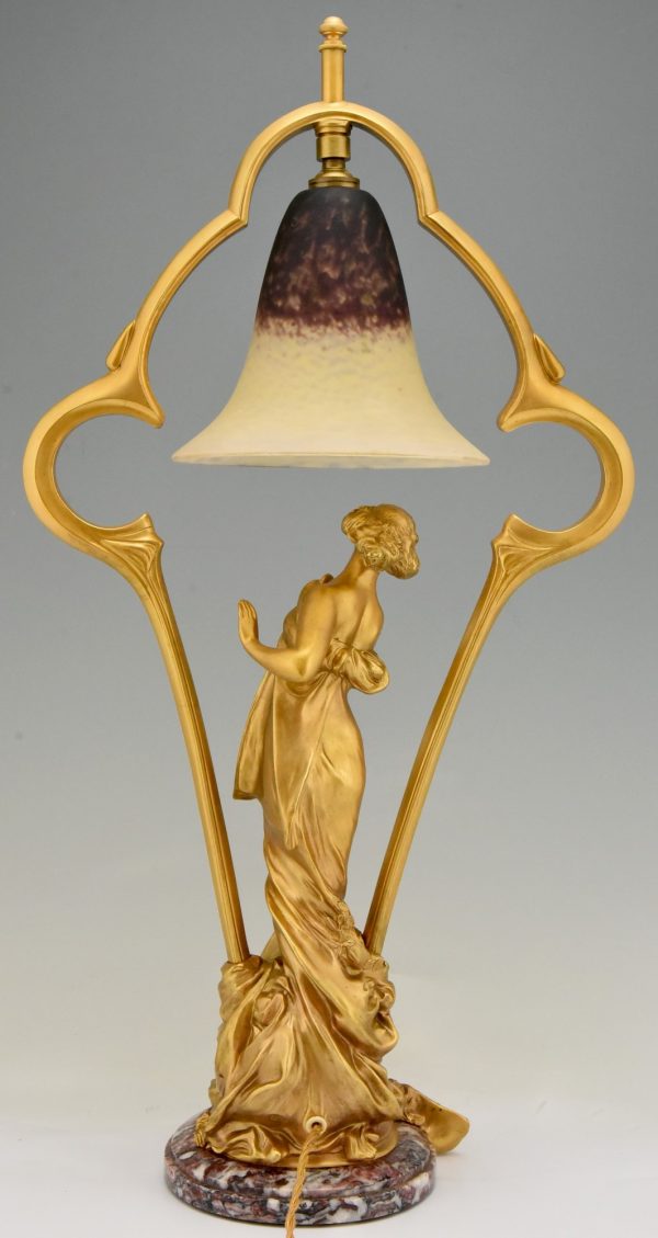 Art Nouveau gilt bronze lamp with lady and cupid