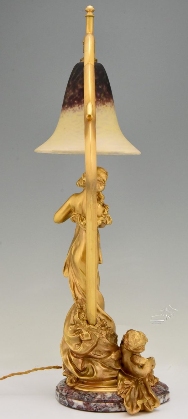 Art Nouveau gilt bronze lamp with lady and cupid