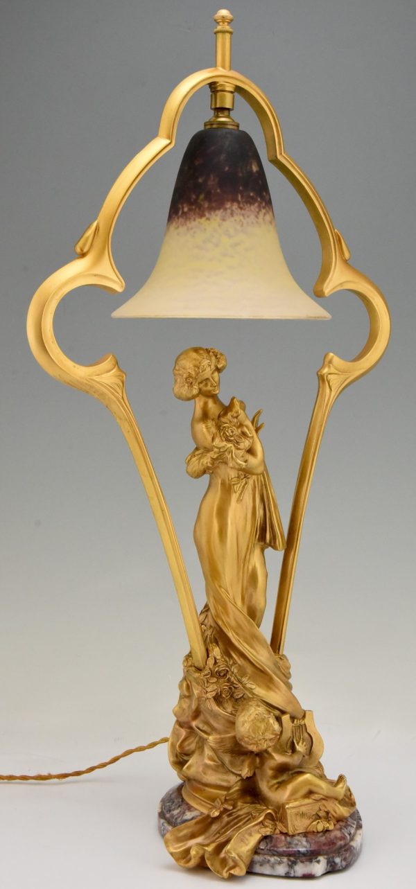 Art Nouveau gilt bronze lamp with lady and cupid