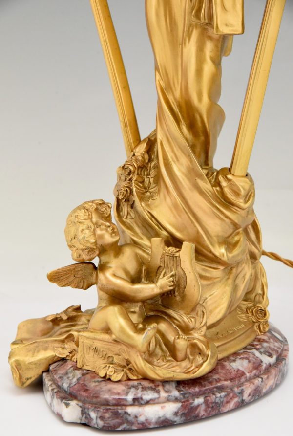 Art Nouveau gilt bronze lamp with lady and cupid