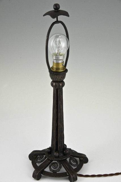 Art Deco wrought iron and glass table lamp.