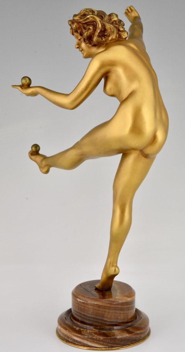 Art deco sculpture en bronze femme nue jongleuse