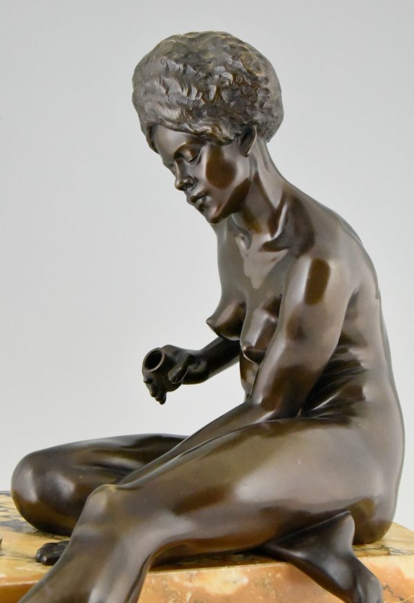 Art deco bronze sculpture African nude with dice.