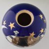 Large blue boule vase with cat, moon and stars