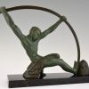 Art Deco sculpture athletic man bending a bar “L’age du bronze”