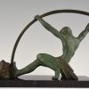 Art Deco sculpture athletic man bending a bar “L’age du bronze”