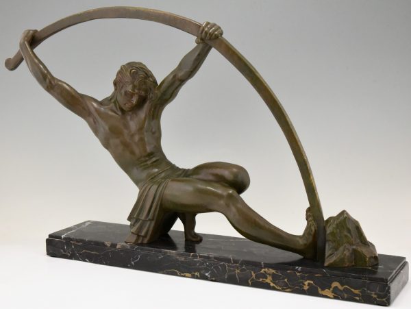 Art Deco bronzen sculptuur man die staaf buigt l’age du bronze