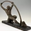 Art Deco bronzen sculptuur man die staaf buigt l’age du bronze