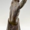 Art Deco sculpture en bronze “l’age du bronze” homme avec barre