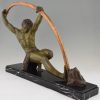 Art Deco sculpture athlete bending a bar, L’age du bronze