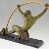 Art Deco sculpture athlete bending a bar, L’age du bronze