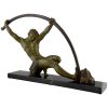 Art Deco sculpture athletic man bending a bar